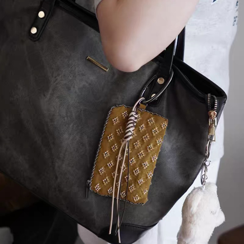 Mini borse con ciondoli per ac - Women Bags Max recensione e prezzo